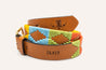 Light brown leather belt with bright yellow, sky blue, green, and orange stitching. Zilker Belt logo embossing and recording microphone embossing.