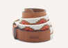 a Zilker Belts ATX Light belt with an orange and white pattern.