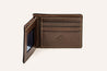 A Bouldin Creek brown leather wallet on a white background by Zilker Belts.