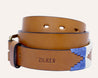 a brown Deep Eddy belt with a blue and white aztec pattern from Zilker Belts.