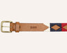 a Willie belt with a red, blue, and white pattern from Zilker Belts.