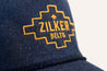 A cool and comfortable Denim "J Willy" Hat (LIMITED EDITION) with the words Zilker Belts on it.
