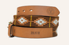 A Texas Wildlife Association (PREORDER) belt with white and orange geometric embroidery and a stamped logo that reads "Zilker Belts" on a white background.