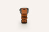 A Zilker Apple Watch Band with a brown leather strap.
