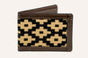A Barton Hills black and tan wallet with a geometric pattern from Zilker Belts.