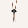 A Zilker Bolo Tie with a turquoise stone and a brown leather cord.