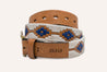 A Cowboy leather belt with blue and white designs from Zilker Belts.