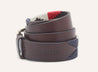 a brown leather Freedom belt with a red, white and blue stripe from Zilker Belts.