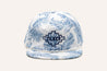 A white and blue Imperial Summer Hat with palm leaves on it by Zilker Belts.