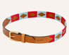a Landshark belt with a red, blue and white pattern from Zilker Belts.