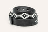 A Midnight Rider leather belt with a white and black geometric pattern from Zilker Belts.