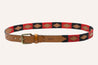 A Red River belt with a red, black and brown pattern by Zilker Belts.