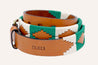 A green and white belt with the word Save Muny on it, made by Zilker Belts.