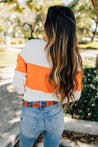 The back of a woman wearing a Sunshine belt from Zilker Belts.