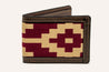 A Travis Heights wallet with a maroon and tan pattern from Zilker Belts.