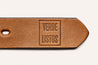 A leather belt with the word Verde Zilker Belts on it.