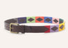 a Waterloo belt with multicolored squares and a buckle from Zilker Belts.