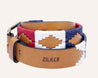 A red, white and blue Willie belt with the word Zilker Belts on it.
