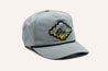 A Zilker Belts gray Zilker Sessions Hat with a colorful patch on it.